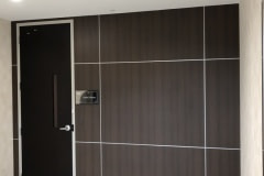 Custom wall panel built for lobby renovation in the Raleigh-Durham area. This shows the final product after the panels have been wrapped with architectural film and the aluminum reveals were installed.