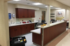 Belbien architectural film installation on a nurse's station and cabinets in an eastern North Carolina hospital (before photo).