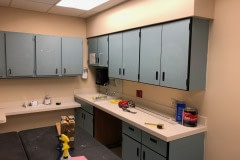 Belbien architectural film installation on a nurse's station and cabinets in an eastern North Carolina hospital (before photo).